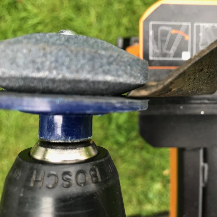 Sherem Lawnmower Blade Sharpener in garden